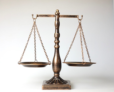 Legal justice concepts with a measuring scale