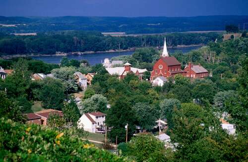 Overhead view of town buildings, trees and a river in Hermann, Missouri.