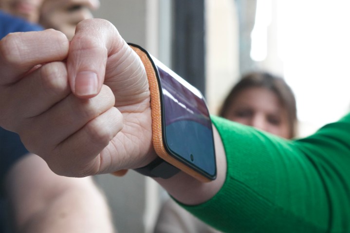 Someone wearing Motorola's concept folding phone on their wrist.