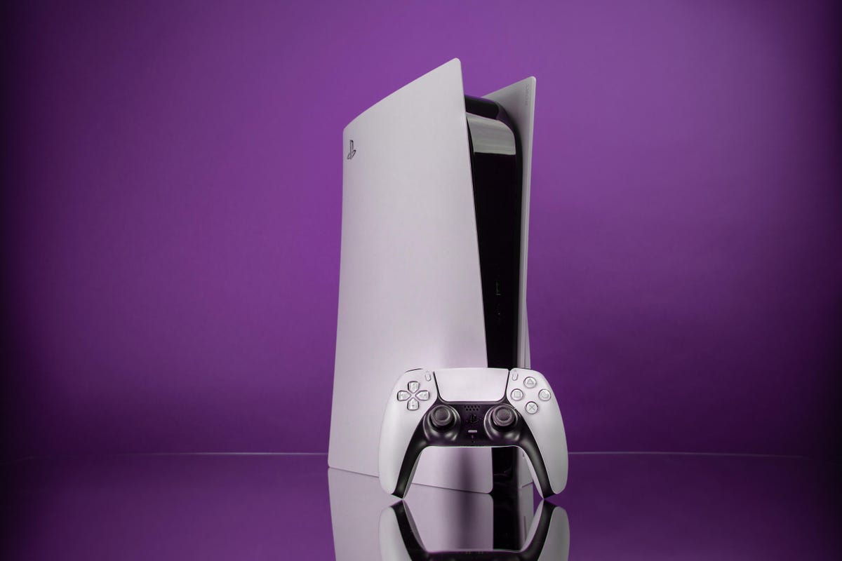 A white PS5 on a purple background