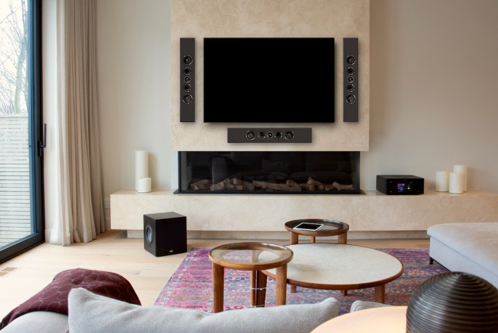 The PSB SubSeries PB8 in a living room and a surround sound system.