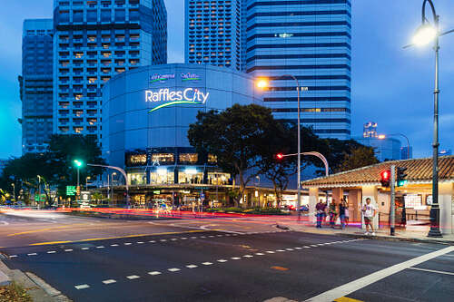 Raffles City Singapore at night