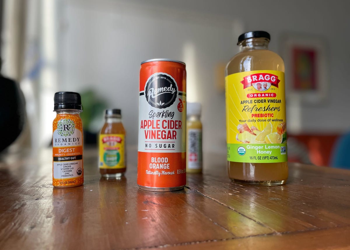 bottles of apple cider vinegar drinks on table