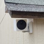 A mounted Wyze outdoor camera.