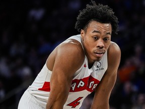 Toronto Raptors forward Scottie Barnes pauses before taking free throws.