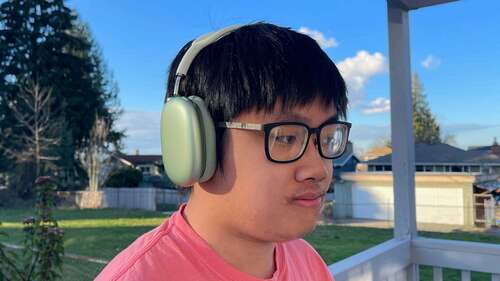 Peter wearing AirPods Max