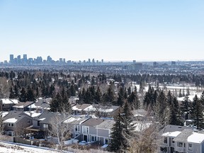 A view of the Calgary skyline with suburban houses in the foreground was photographed on Wednesday, March 22, 2023.