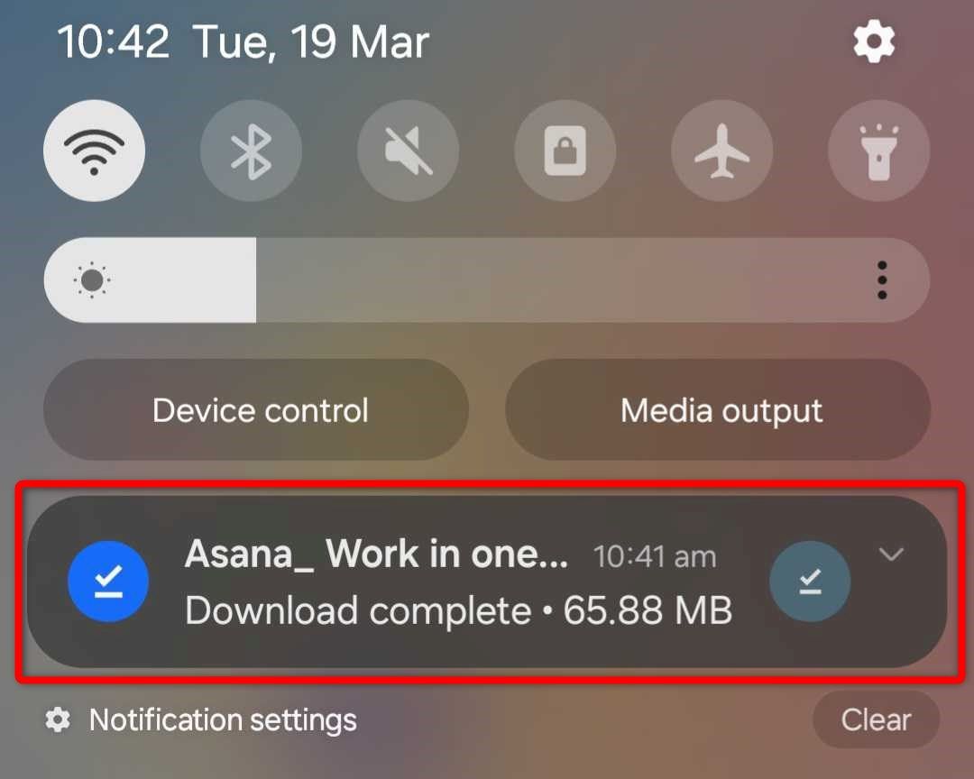 Opening the APK of an Asana app on an Android device.