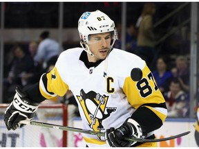 Sidney Crosby of the Penguins plays with the puck during warm-ups prior to playing against the Rangers in Game 5 of the First Round of the 2022 Stanley Cup Playoffs at Madison Square Garden in New York City on May 11, 2022.