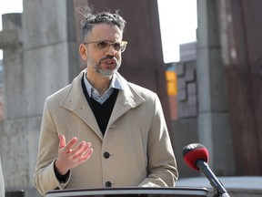 Yavar Hameed, a lawyer representing the six community groups, speaks to media on Monday. Hameed says the police board's rules for delegates place a 'heavy burden' on people from marginalized groups who want to present at the board meetings.