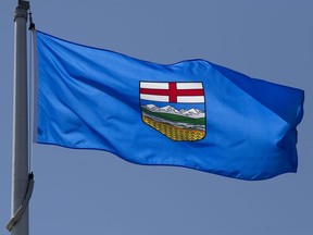 Environmental groups want Ottawa to enforce its rules on an Alberta coal mine that has started building an underground test mine without fisheries permits that officials have said are required. Alberta's provincial flag flies on a flagpole in Ottawa, Monday July 6, 2020.