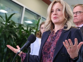 Rachel Notley at a podium