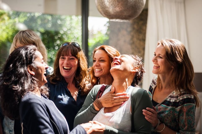 Group of women having an enjoyable interaction.