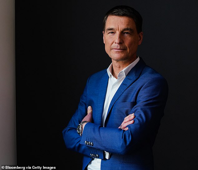 Drivers are shunning electric vehicles (EVs) because they are 'scared of change', according to the boss of European car company Polestar Thomas Ingenlath (pictured)