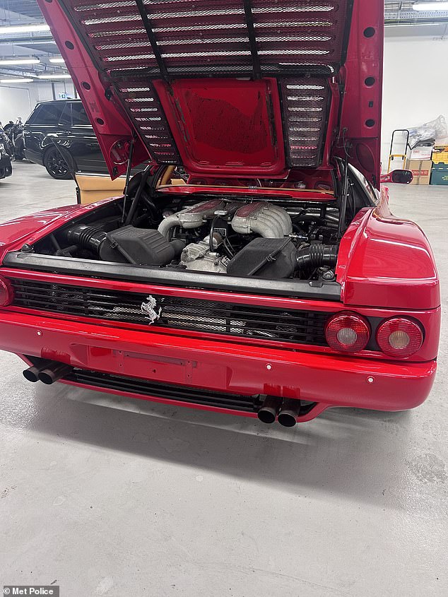 The red Ferrari F512M was one of two of the Italian sports cars taken while their drivers were at the San Marino Grand Prix held at Imola in Italy in April 1995