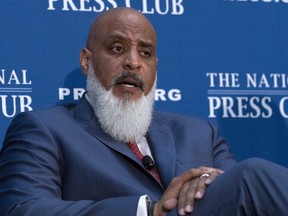 MLB Players Association head Tony Clark speaks during a news conference.