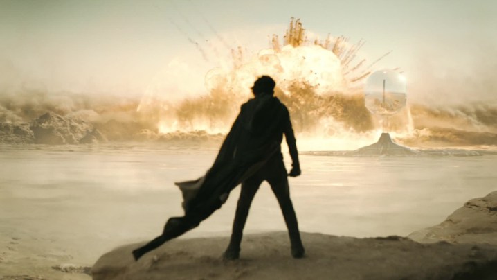 Timothée Chalamet gazes upon a distant explosion in a still from Dune: Part Two