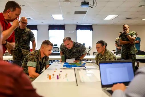 July 22, 2022 - Marine Corps Base Camp Lejeune, North Carolina, USA - U.S. Marines with II Marine Expeditionary Force attend the Basic Analytic Wargaming Course on Marine Corps Base Camp Lejeune, North Carolina, July 22, 2022. The BAWC is a 5-day course that provides students a hands-on experience with designing, developing, executing, and analyzing wargames. Wargames are a form of strategy game and essential to applying Marine Corps concepts of the 21st century, replicating or creating military scenarios that assists military personnel to train the mind in the art of strategic thinking. (Credit Image: © U.S. Marines/ZUMA Press Wire Service/ZUMAPRESS.com