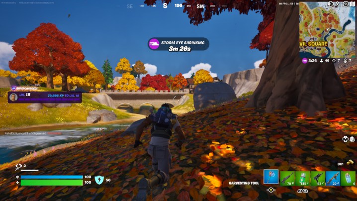 Character running by trees in Fortnite.