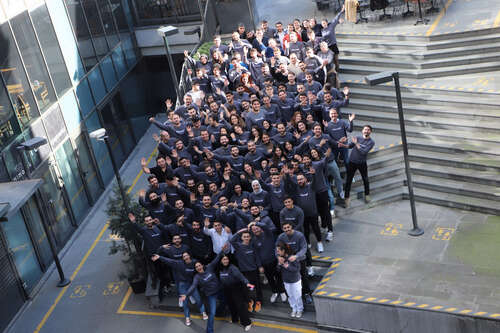 The Getmobil team outside of its headquarters and repair lab