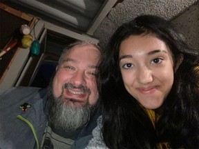 Greg Sword and his 14-year-old daughter, Kamilah.