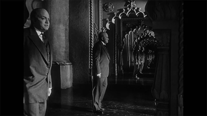 An old man walks in a hall of mirrors in Citizen Kane.