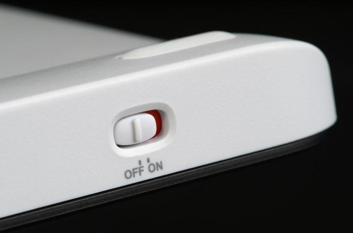 The on and off switch for a Logitech Wireless Touch Keyboard K400.