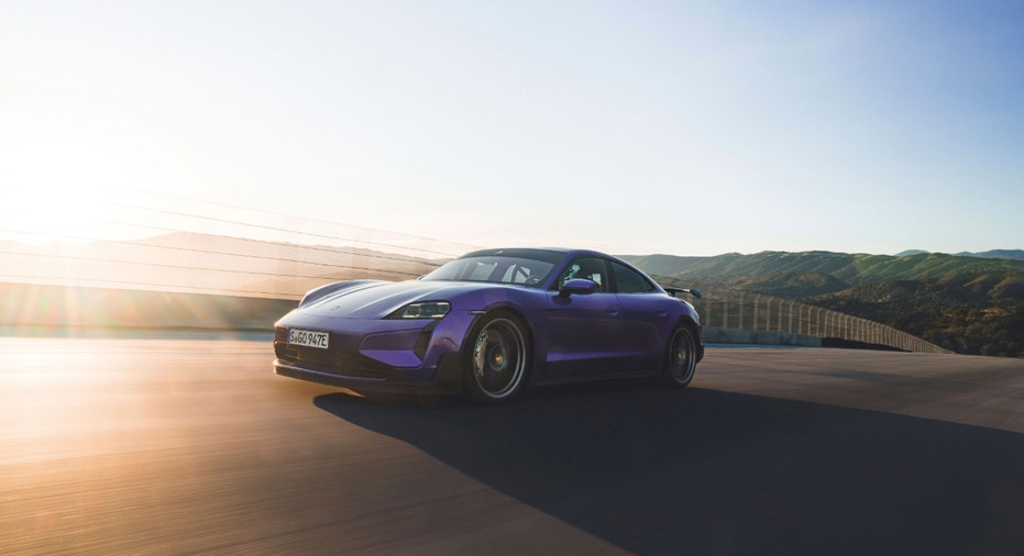 Dark blue Porsche Taycan Turbo GT with the Weissach package.