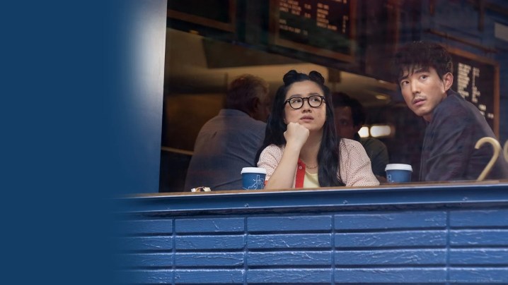 Two people sit in a café in Shortcomings.