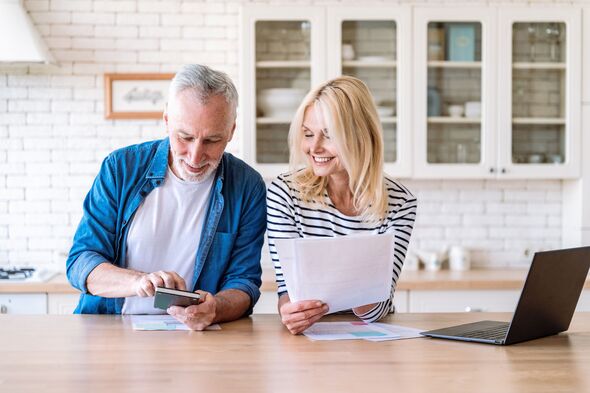 Couple managing household budget together