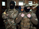 Two foreign fighters from Britain pose for a picture in Lviv, Ukraine, before heading toward the fighting. “They only accept people with previous military experience,” a Canadian who wanted to fight for Ukraine found out.