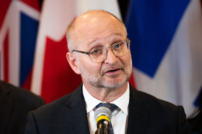 Justice Minister David Lametti is pictured at a news conference.