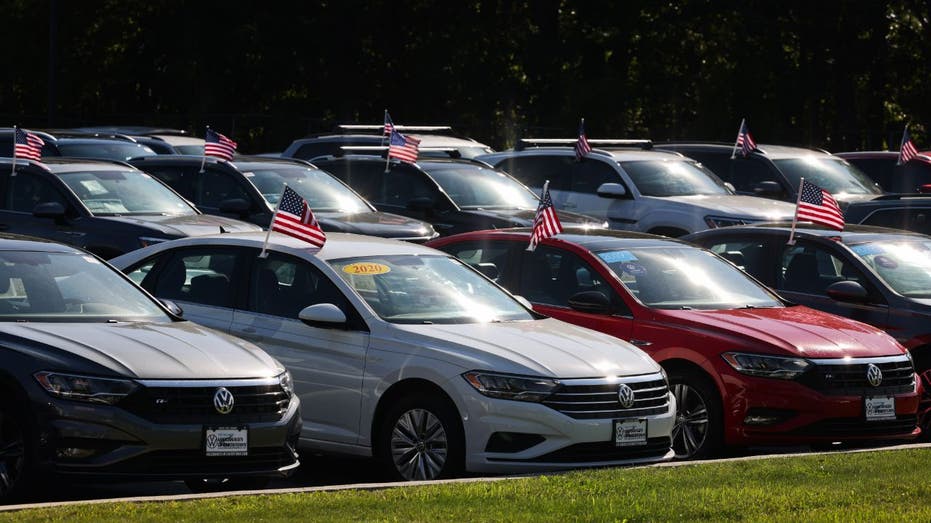 cars lined up on Volkswagen lot