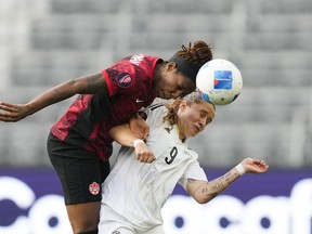 Canada defender Kadeisha Buchanan, left, and Costa Rica forward Maria Paula Salas vie for the ball during the first half of a CONCACAF Gold Cup women's soccer tournament quarterfinal Saturday, March 2, 2024, in Los Angeles.