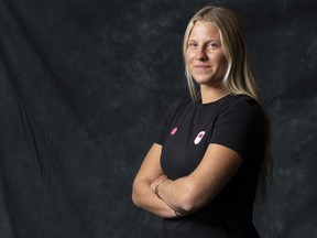 Canadian athlete and surfer Sanoa Olin, poses during media day organized by the Canadian Olympic Committee in Montreal on Thursday, Dec.,14, 2023.