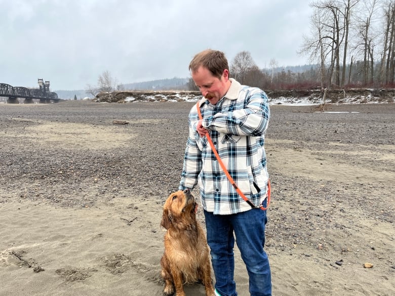 A man and his dog.