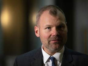 SaskParty MLA Dustin Duncan speaks to reporters at the Legislative Building on Wednesday, November 17, 2021 in Regina.