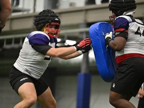 Nathaniel Dumoulin-Duguay (left), shown in a handout photo from the CFL combine, doesn't have any problem with football coaches yelling instructions or criticism. The offensive lineman out of Laval University spent almost a year in the Canadian Army and says basic training included long days starting at 4 a.m. and military personnel barking out orders.