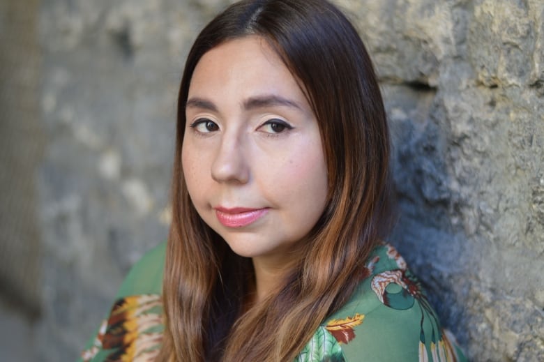 An up-close portair of an Indigenous woman. 