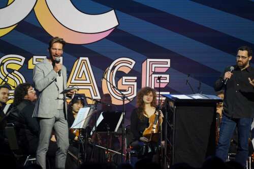 Troy Baker and Austin Wintory on stage at the GDC concert.