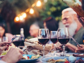 People dining together on a rooftop.