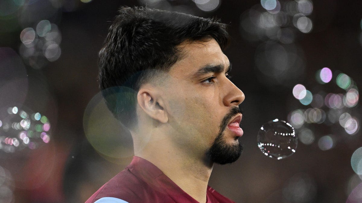 Side on image of West Ham midfielder Lucas Paqueta looking leftwards, surrounded by bubbles.