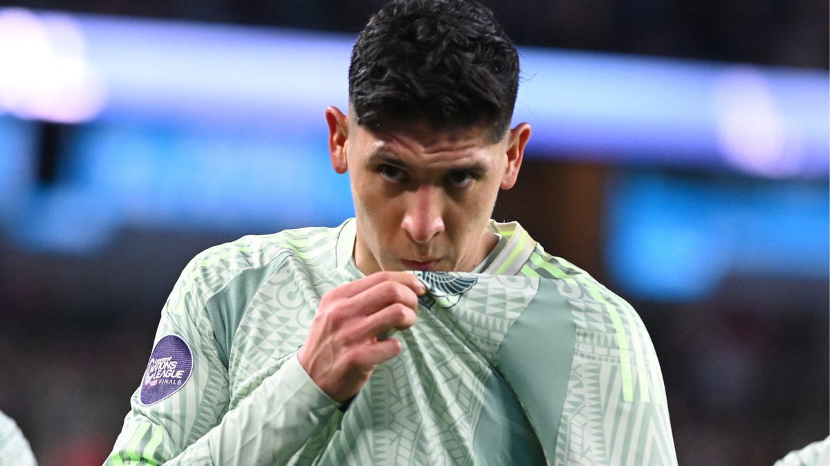 Edson Alvarez of Mexico kisses his jersey's team logo.