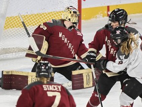 Ottawa's Daryl Watts (9) scores against Montreal goaltender Ann-Renee Desbiens during second period PWHL hockey action in Laval, Que., Sunday, March 10, 2024.