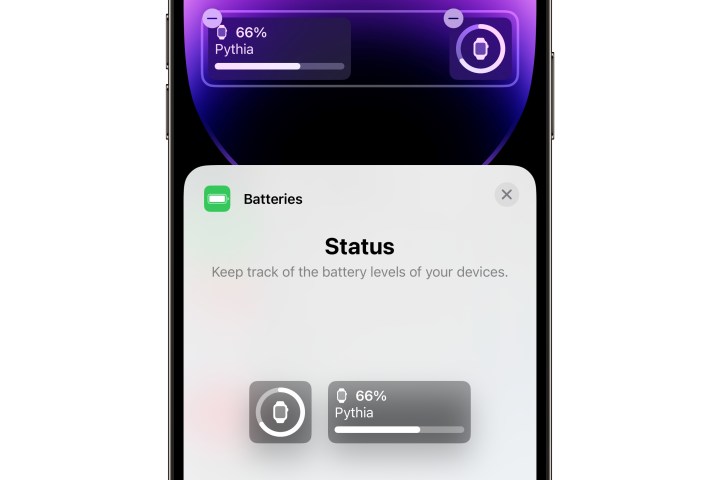 iPhone showing Batteries widgets being added to lock screen in iOS 17.