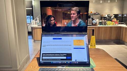 Asus Zenbook Duo inside Starbucks on a table