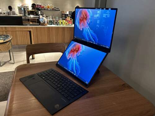 Asus Zenbook Duo with detachable keyboard on a table