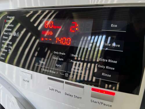 Touch interface on an AEG washing machine.