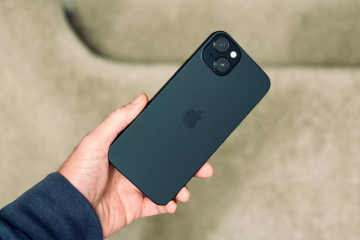 A person holding the Apple iPhone 15 Plus.