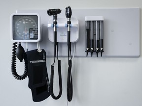 Medical tools are pictured in an exam room at a health clinic in Calgary, Friday, July 14, 2023. British Columbia, along with the Northwest Territories, has the most extensive scope of practice for naturopathic doctors in Canada, including the ability to prescribe drugs and the option to be certified to administer vaccines.